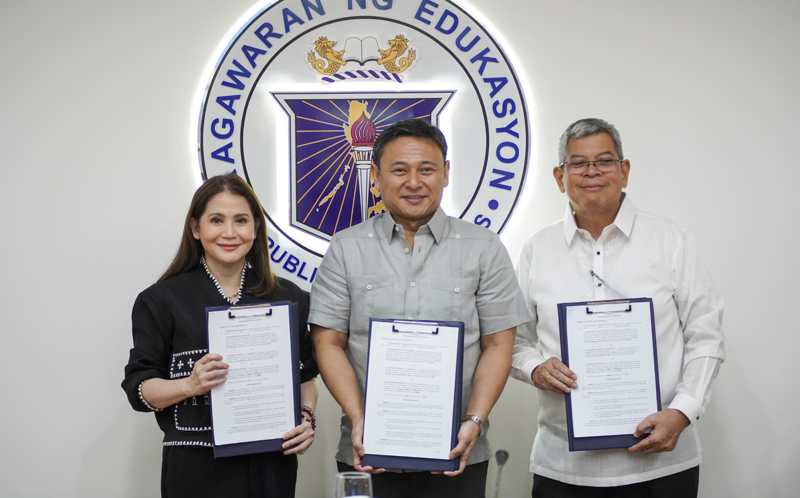 BSP Deputy Governor Bernadette Romulo-Puyat, DepEd Secretary Sonny Angara, and BDO Foundation President Mario Deriquito during the MoA-signing.